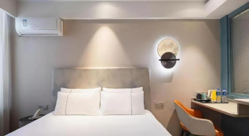 Bed in Magnotel Harbin Medical University First Affiliated Hospital