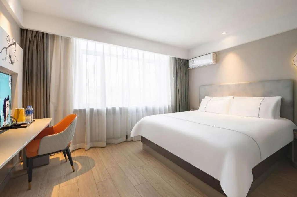 Bed in Magnotel Harbin Medical University First Affiliated Hospital