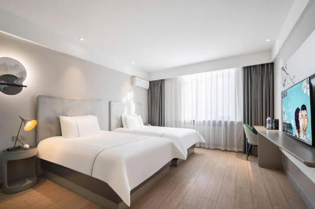 Bed in Magnotel Harbin Medical University First Affiliated Hospital