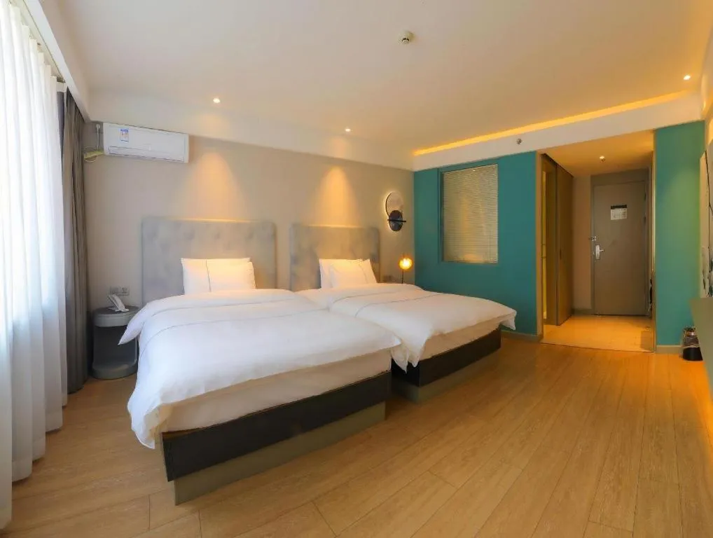 Bed in Magnotel Harbin Medical University First Affiliated Hospital