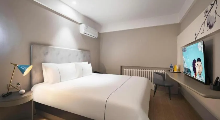 Bed in Magnotel Harbin Medical University First Affiliated Hospital