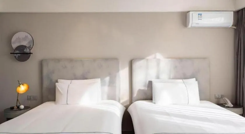 Bed in Magnotel Harbin Medical University First Affiliated Hospital