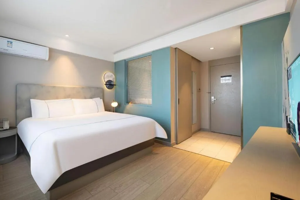 Bed in Magnotel Harbin Medical University First Affiliated Hospital