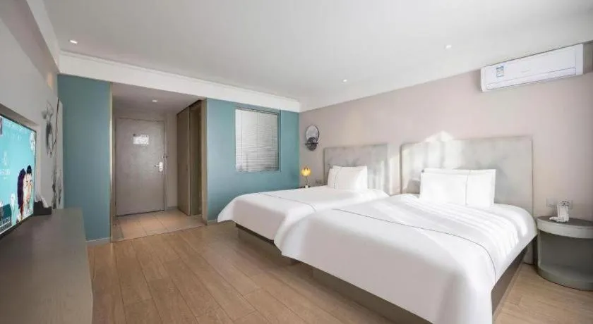 Bed in Magnotel Harbin Medical University First Affiliated Hospital