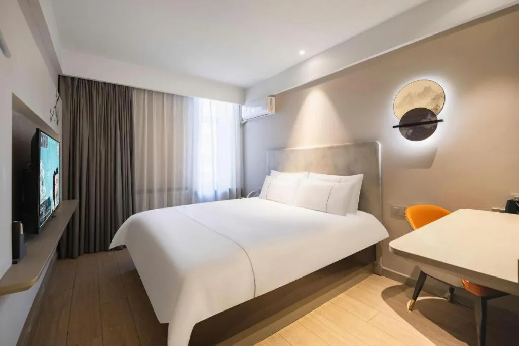 Bed in Magnotel Harbin Medical University First Affiliated Hospital