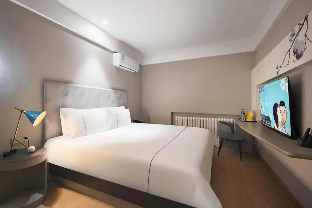 Bed in Magnotel Harbin Medical University First Affiliated Hospital