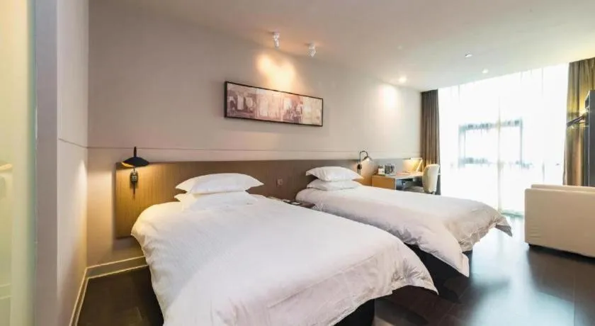 Bed in Jinjiang Inn Select Yancheng Oufeng Hua Street Julong Lake