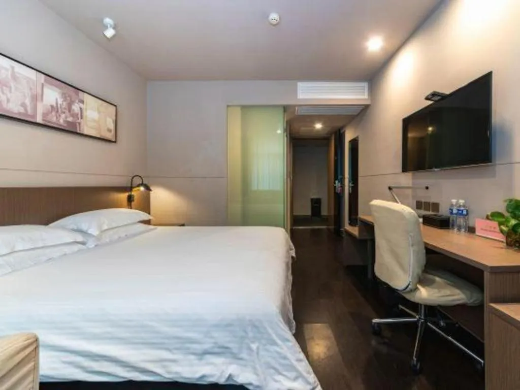 Bed in Jinjiang Inn Select Yancheng Oufeng Hua Street Julong Lake