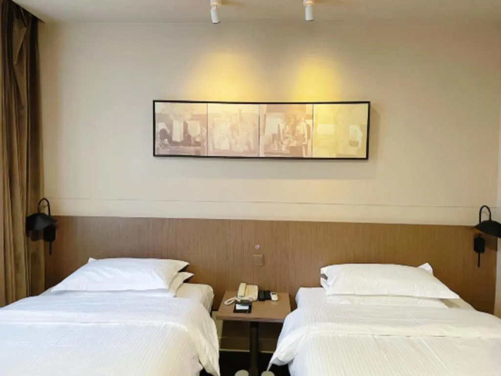 Bed in Jinjiang Inn Select Yancheng Oufeng Hua Street Julong Lake