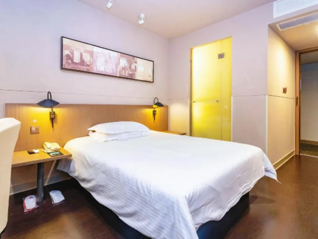 Bed in Jinjiang Inn Select Yancheng Oufeng Hua Street Julong Lake