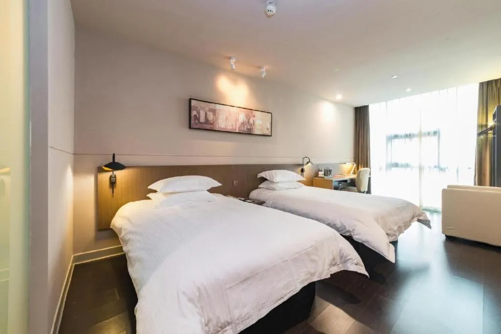 Bed in Jinjiang Inn Select Yancheng Oufeng Hua Street Julong Lake