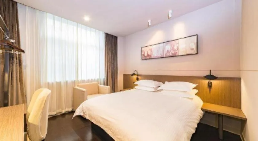 Bed in Jinjiang Inn Select Yancheng Oufeng Hua Street Julong Lake