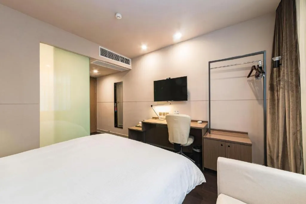 Bed in Jinjiang Inn Select Yancheng Oufeng Hua Street Julong Lake