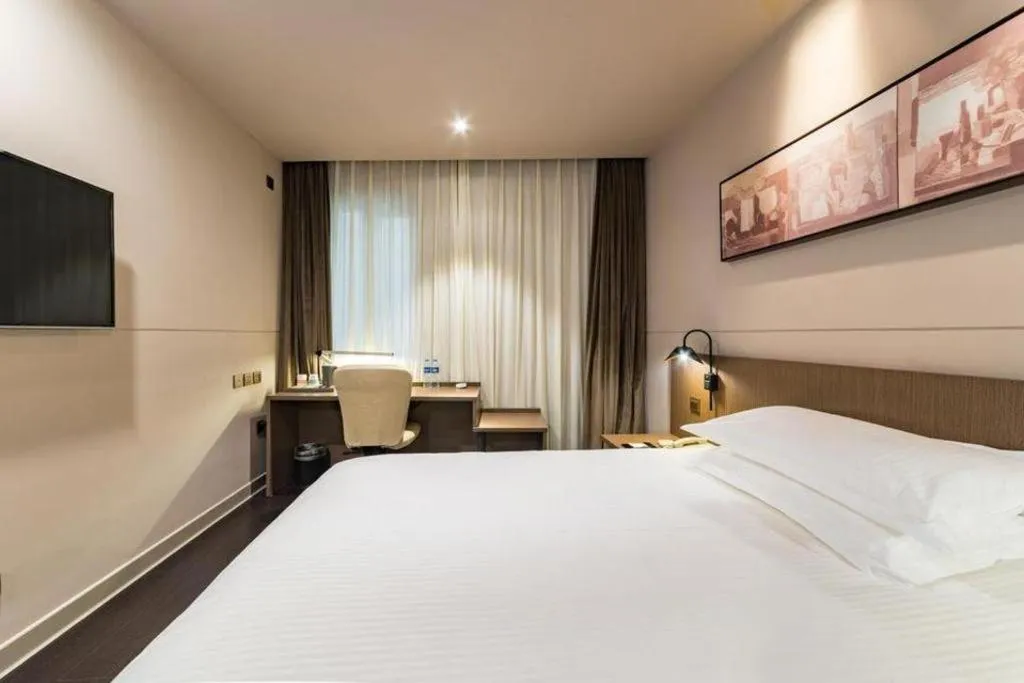Bed in Jinjiang Inn Select Yancheng Oufeng Hua Street Julong Lake