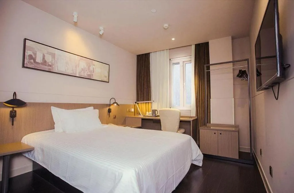 Bed in Jinjiang Inn Select Yancheng Oufeng Hua Street Julong Lake