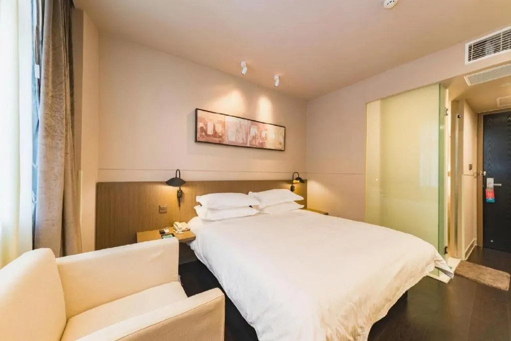 Bed in Jinjiang Inn Select Yancheng Oufeng Hua Street Julong Lake
