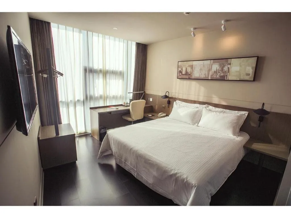 Bed in Jinjiang Inn Select Yancheng Oufeng Hua Street Julong Lake