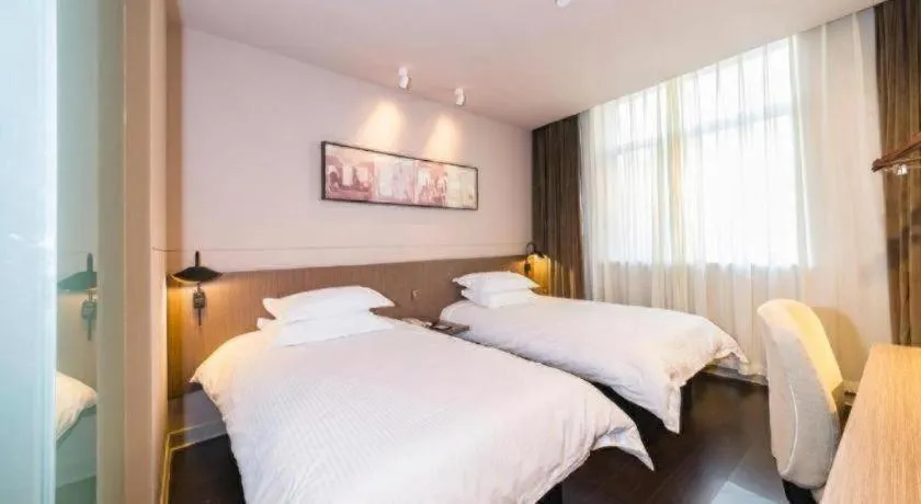 Bed in Jinjiang Inn Select Yancheng Oufeng Hua Street Julong Lake