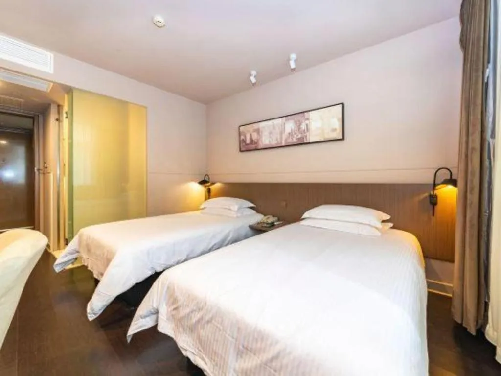 Bed in Jinjiang Inn Select Yancheng Oufeng Hua Street Julong Lake