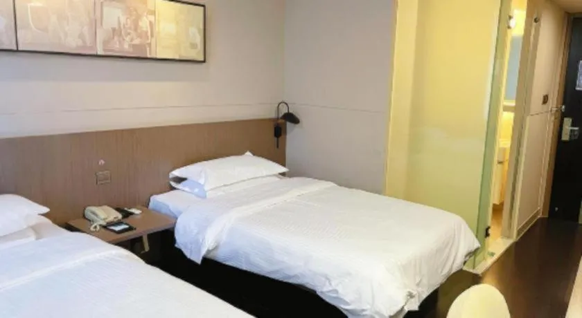 Bed in Jinjiang Inn Select Yancheng Oufeng Hua Street Julong Lake