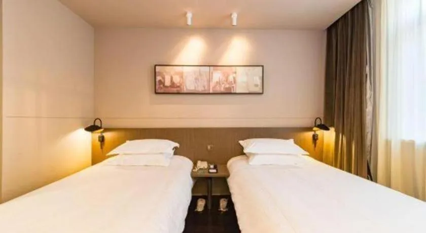 Bed in Jinjiang Inn Select Yancheng Oufeng Hua Street Julong Lake