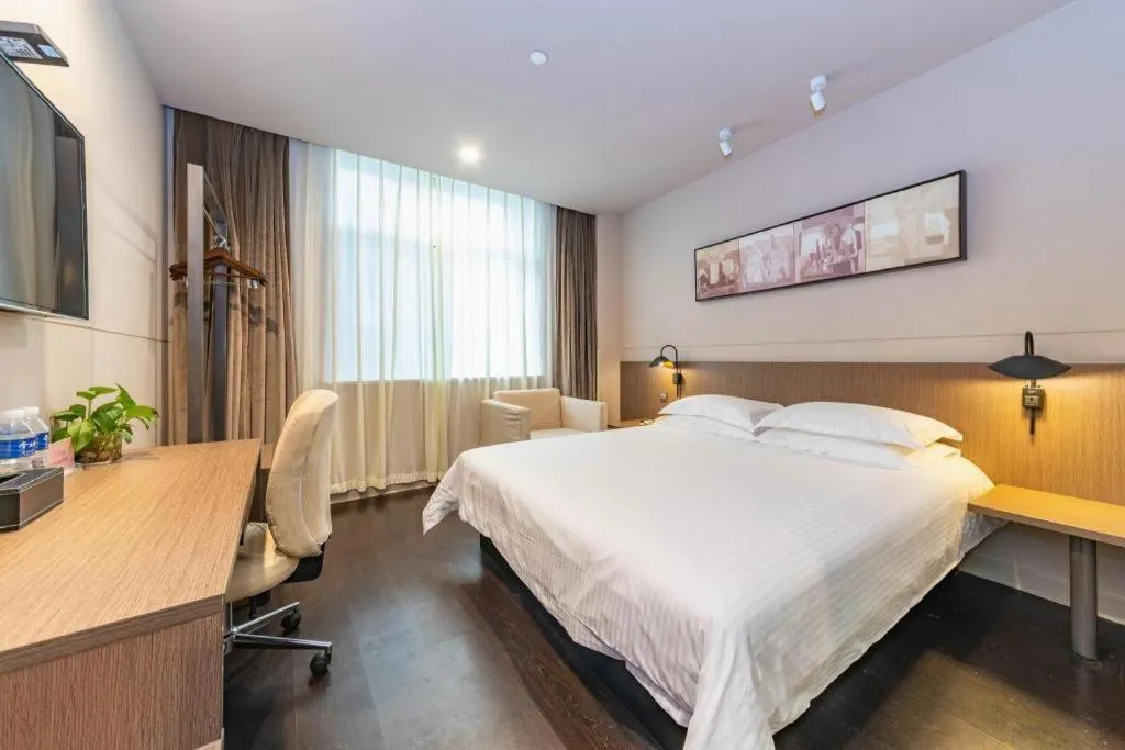 Bed in Jinjiang Inn Select Yancheng Oufeng Hua Street Julong Lake