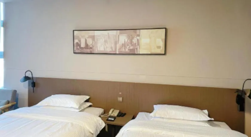 Bed in Jinjiang Inn Select Yancheng Oufeng Hua Street Julong Lake