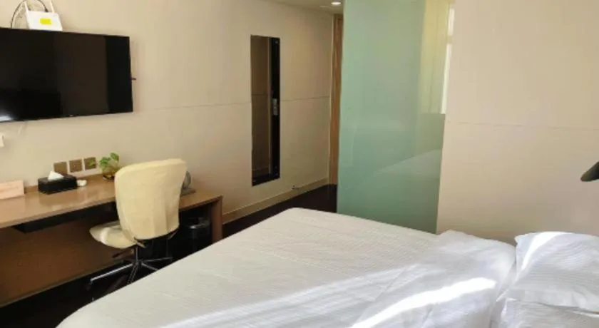 Bed in Jinjiang Inn Select Yancheng Oufeng Hua Street Julong Lake