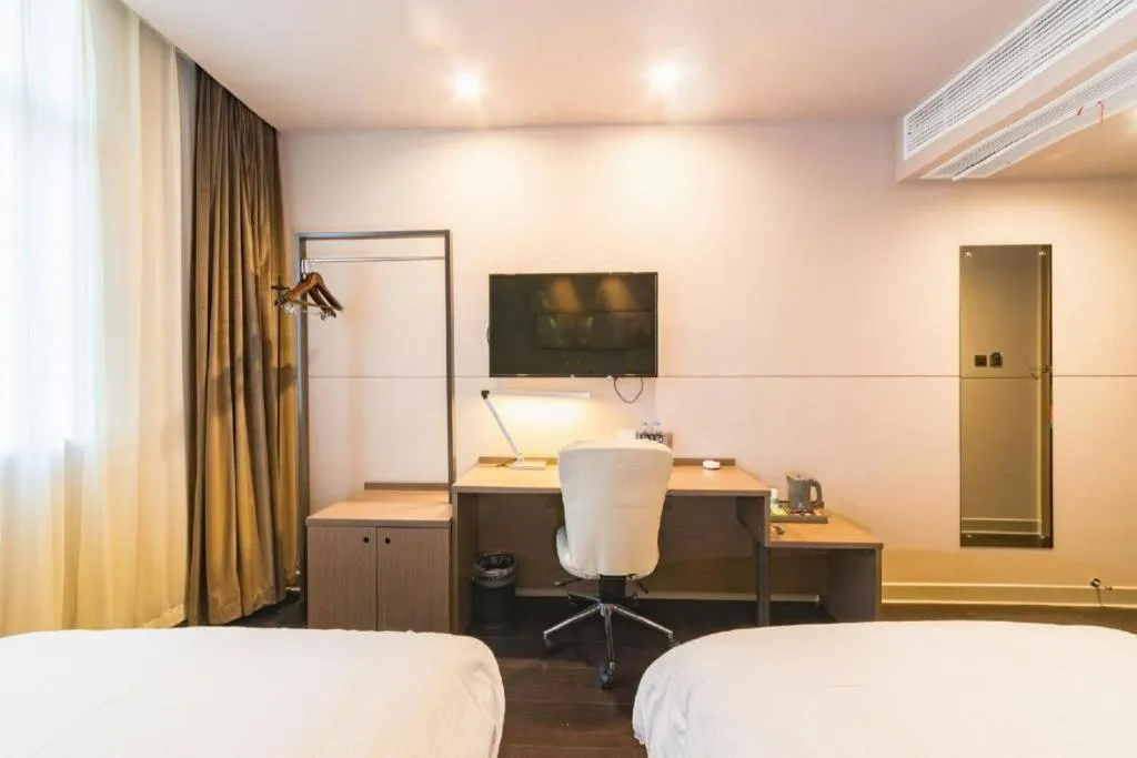 Bed in Jinjiang Inn Select Yancheng Oufeng Hua Street Julong Lake