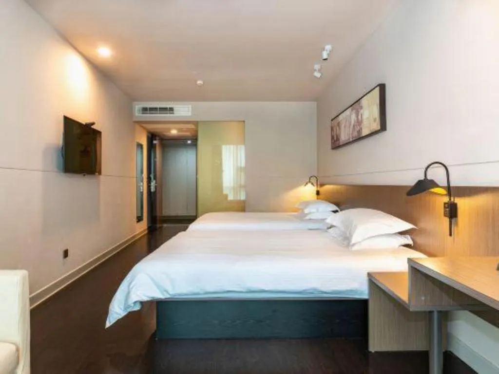 Bed in Jinjiang Inn Select Yancheng Oufeng Hua Street Julong Lake