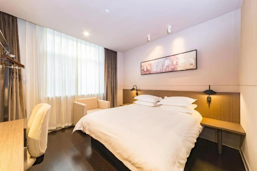 Bed in Jinjiang Inn Select Yancheng Oufeng Hua Street Julong Lake