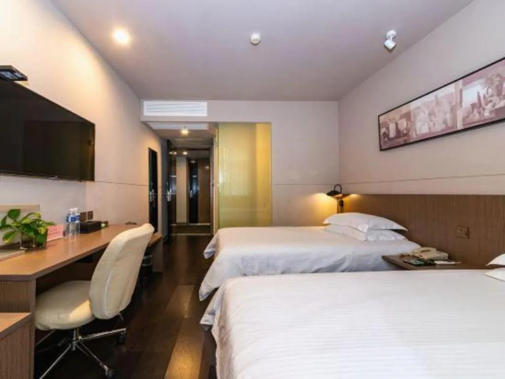Bed in Jinjiang Inn Select Yancheng Oufeng Hua Street Julong Lake