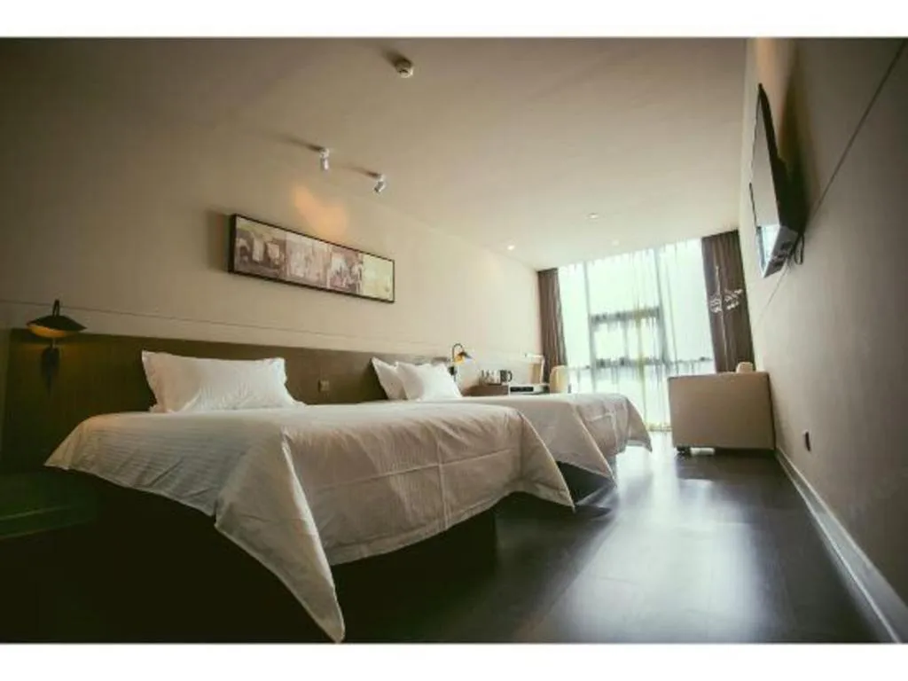 Bed in Jinjiang Inn Select Yancheng Oufeng Hua Street Julong Lake