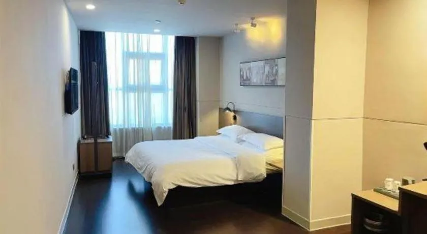 Bed in Jinjiang Inn Select Yancheng Oufeng Hua Street Julong Lake
