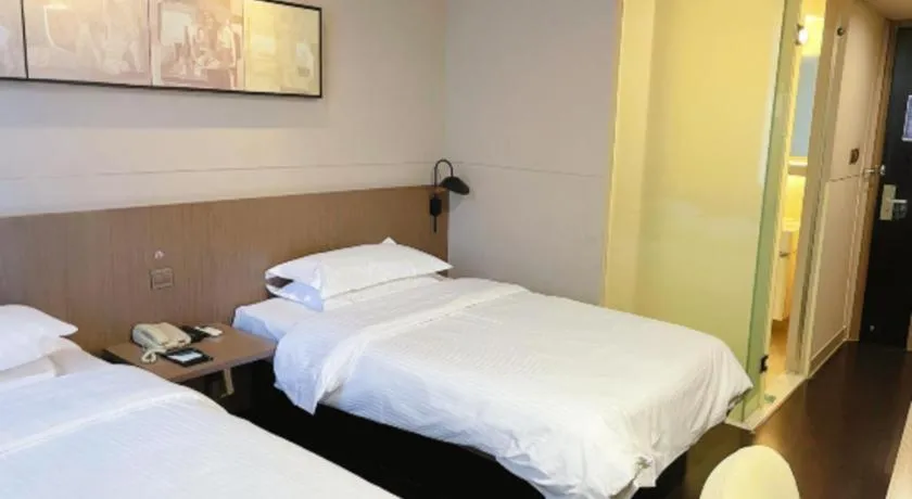 Bed in Jinjiang Inn Select Yancheng Oufeng Hua Street Julong Lake