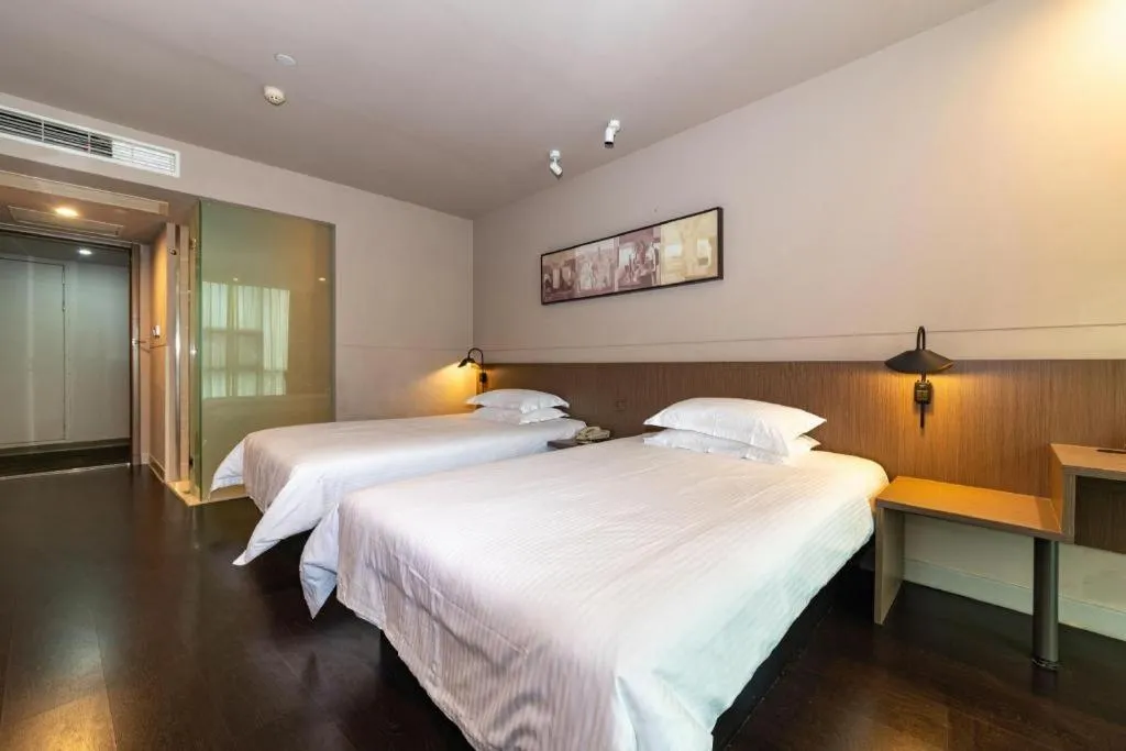 Bed in Jinjiang Inn Select Yancheng Oufeng Hua Street Julong Lake