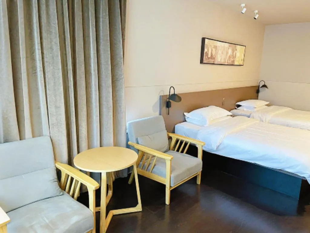 Bed in Jinjiang Inn Select Yancheng Oufeng Hua Street Julong Lake