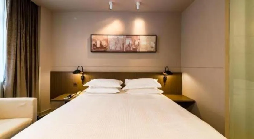 Bed in Jinjiang Inn Select Yancheng Oufeng Hua Street Julong Lake