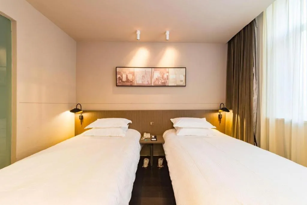 Bed in Jinjiang Inn Select Yancheng Oufeng Hua Street Julong Lake