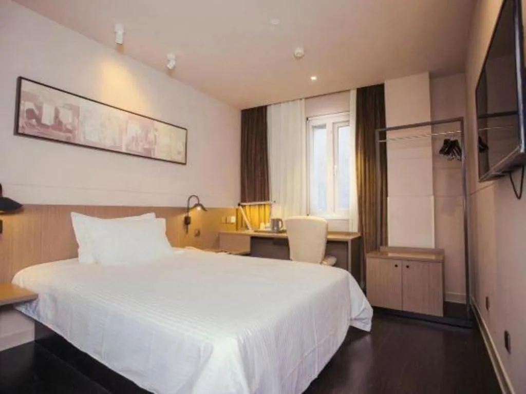 Bed in Jinjiang Inn Select Yancheng Oufeng Hua Street Julong Lake