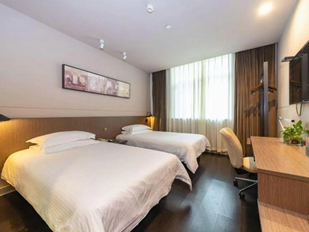 Bed in Jinjiang Inn Select Yancheng Oufeng Hua Street Julong Lake