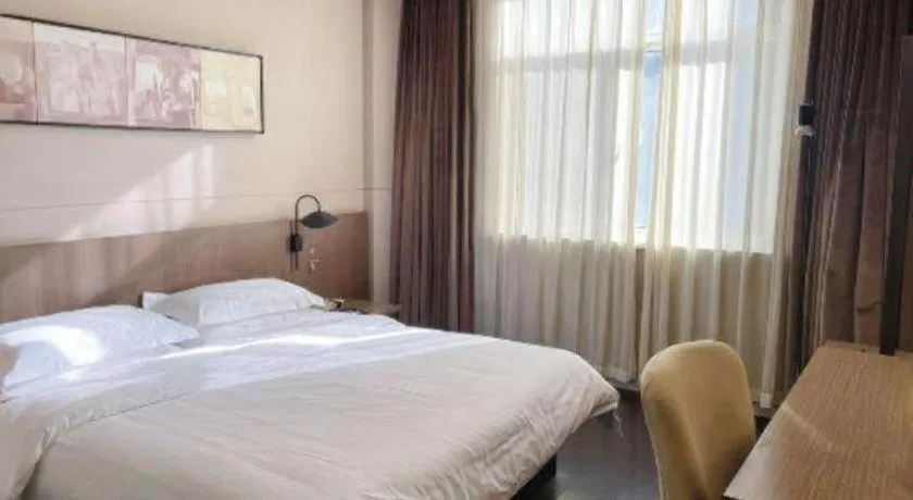 Bed in Jinjiang Inn Select Yancheng Oufeng Hua Street Julong Lake