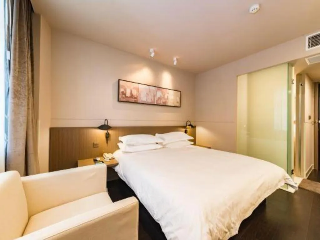 Bed in Jinjiang Inn Select Yancheng Oufeng Hua Street Julong Lake