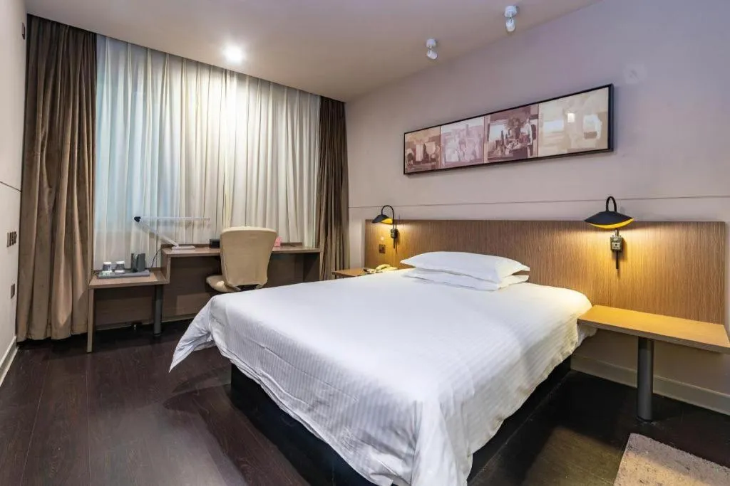 Bed in Jinjiang Inn Select Yancheng Oufeng Hua Street Julong Lake