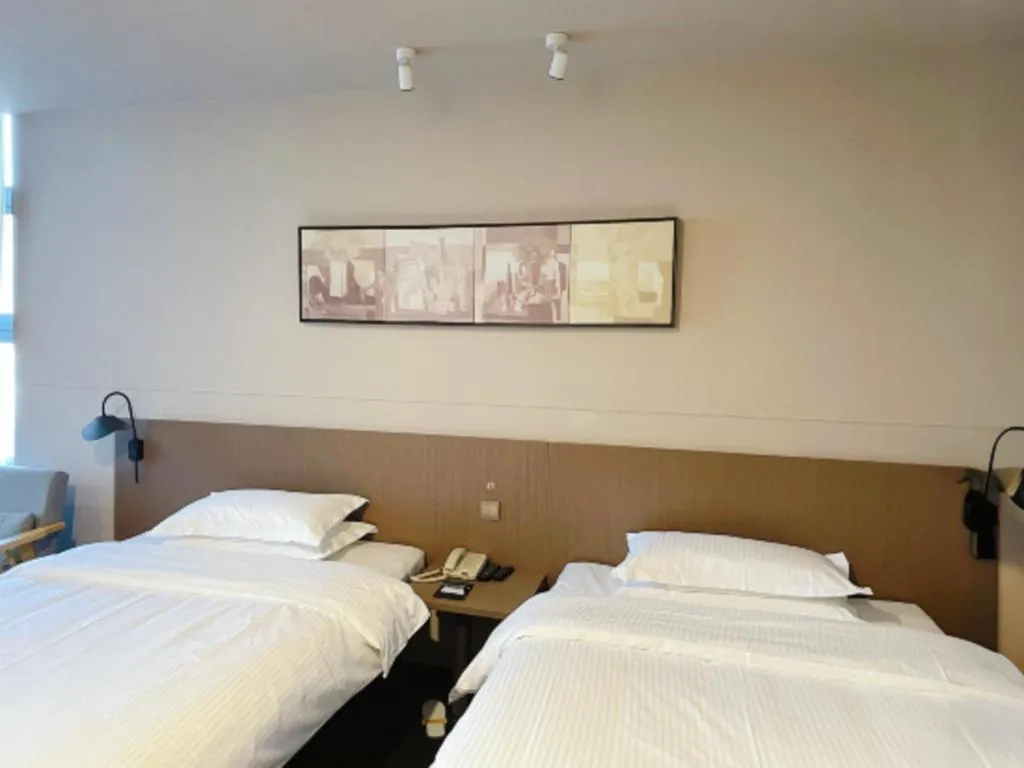 Bed in Jinjiang Inn Select Yancheng Oufeng Hua Street Julong Lake