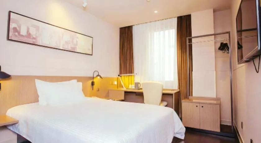 Bed in Jinjiang Inn Select Yancheng Oufeng Hua Street Julong Lake