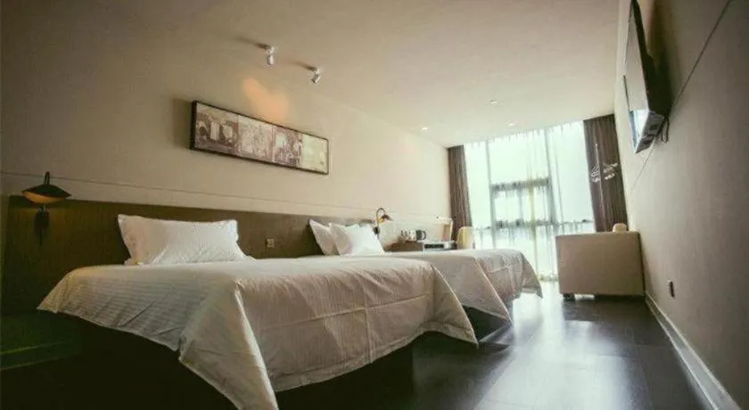 Bed in Jinjiang Inn Select Yancheng Oufeng Hua Street Julong Lake