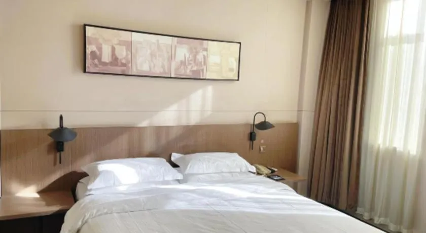 Bed in Jinjiang Inn Select Yancheng Oufeng Hua Street Julong Lake
