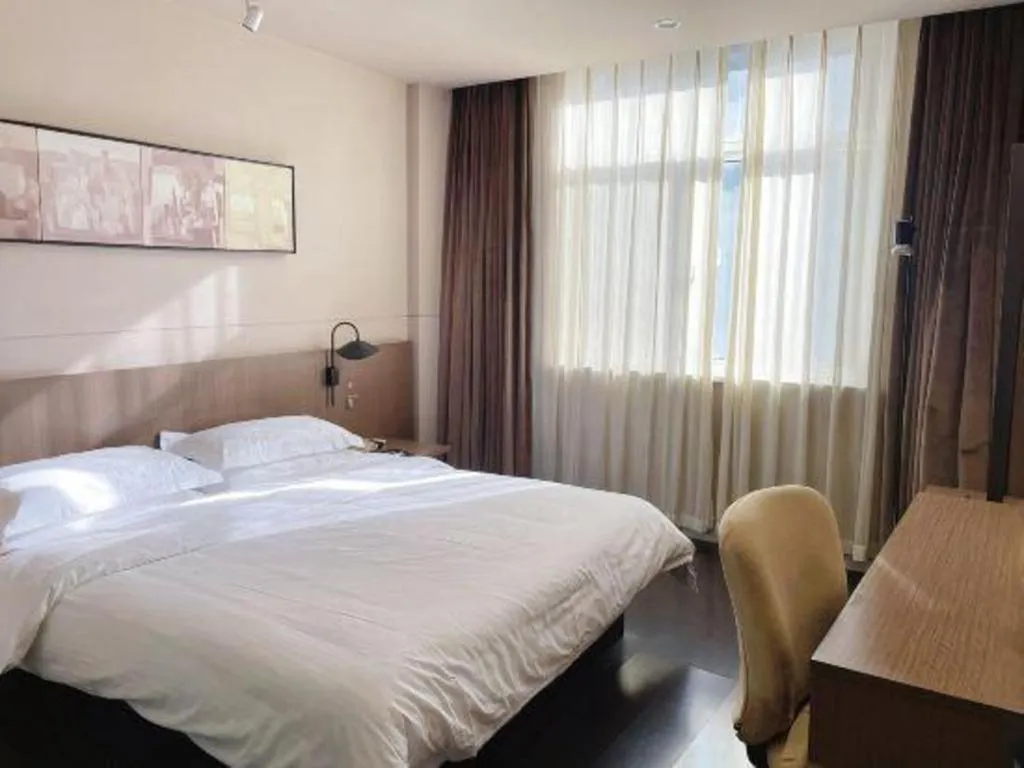 Bed in Jinjiang Inn Select Yancheng Oufeng Hua Street Julong Lake
