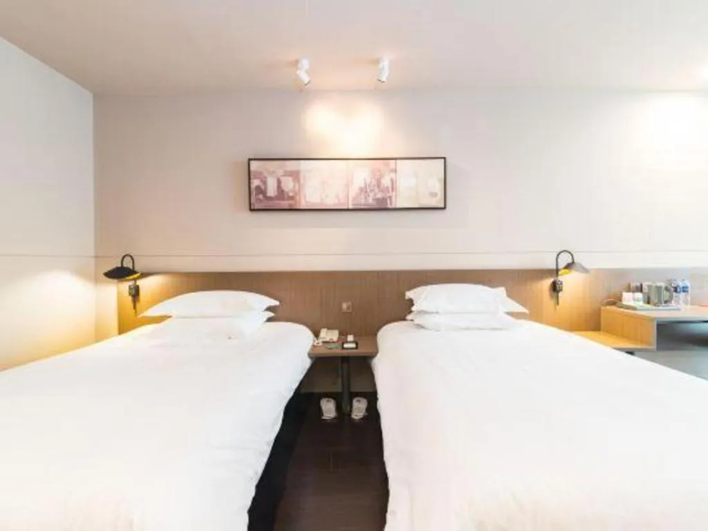 Bed in Jinjiang Inn Select Yancheng Oufeng Hua Street Julong Lake